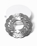 A silver metallic brake disc with a drilled and slotted pattern, shown in front of a white circular display stand on a white background. The black 'ER' logo is visible in the top-left corner.