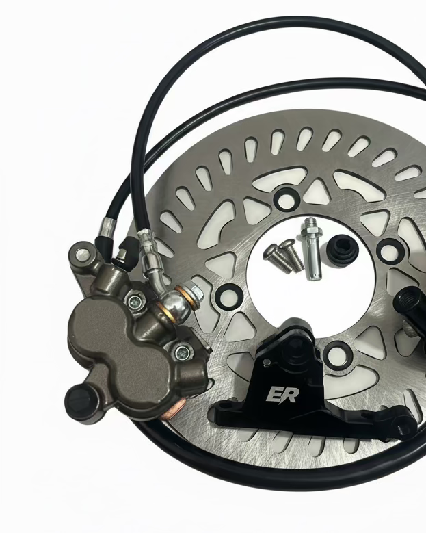 ER Moto ETM RTR front brake kit close-up — ER branded caliper mount, rotor, caliper, and mounting hardware detail
