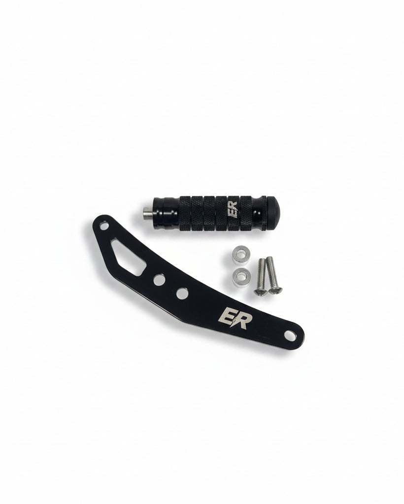 ER Moto Yozma IN 10 ShiftLock black — CNC bracket, knurled footpeg with ER logo, and mounting hardware flat lay