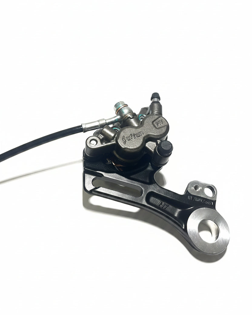 OEM Surron Ultra Bee rear brake caliper